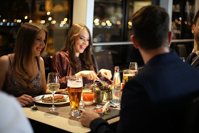Budapest 4 course Dinner Cruise with Bar Piano and Welcome Drink - Getting on board: tickets, restrooms, and where your money really goes