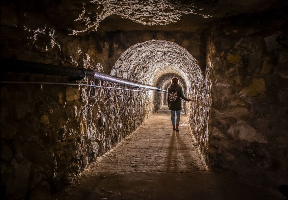 Budapest: Buda Castle Cave Tour - The big story you’ll hear: limestone, cellars, shelters, and prisons