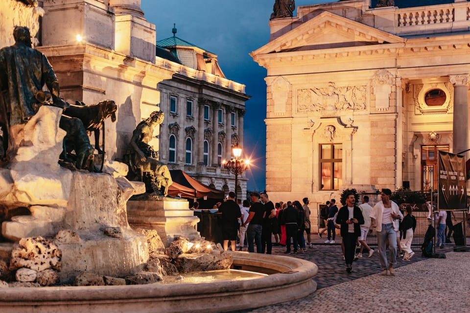 Budapest: Buda Castle District Vampires and Myths Night Tour - Buda Castle photo stop: seeing royal walls without the daytime glare