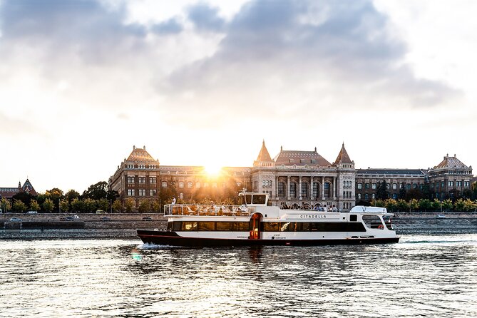 Budapest River Cruise with 1 Free Tokaj Frizzante and Audio Guide - Comfort that actually matters: heated indoor area, blankets, and umbrellas