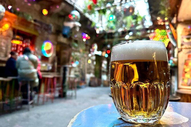 Budapest Ruin Bars Evening Walking Tour with Drinks & Street Food - The walk-and-drink flow: three ruin bars, different vibes each time